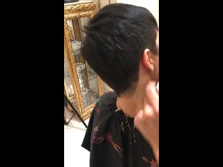 Hairdressers - very short haircut for women at salon