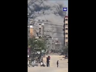 Smoke rising above the Nusairat refugee camp