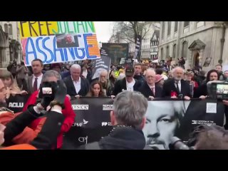 Supporters of Julian Assange march to the office of the British Prime Minister