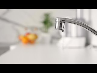 water-dripping-from-faucet-tap-at-kitchen-2023-11-27-05-22-47-utc