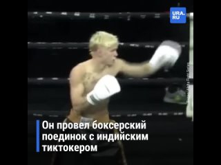 Сбежавший из страны Милохин вышел на ринг с флагом России