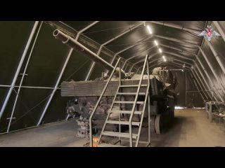 Russian servicemen take German-made Leopard German tank captured in Avdeyevka direction to the repair unit of the Tsentr Group o