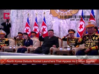 Северная Корея представила новые методы камуфляжа военной техники. А теперь на площадь выходят мирные трактора Северной Кореи