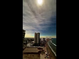 View of the eclipse over a beach in Mexico