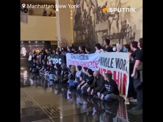 Pro-Palestinian protesters have gathered in the lobby of the corporate media outlet NBC in New York to interrupt President Joe B