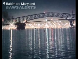 a_Large_Container_Ship_Collides_with_Key_Bridge_Causing_it_completely