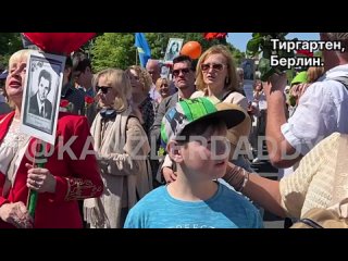 Participants in the Immortal Regiment demonstration in Berlin sing the legendary Katyuscha, despite a police ban. The song w