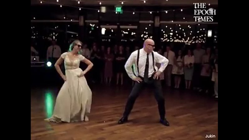 Father and Daughter Surprise Wedding Guests With Epic Dance
