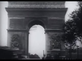 Charles Godefroy flying through the Arc de Triomphe on August 7, 1919.