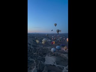 At dusk, the valley around the town of Goreme is filled with swelling and growing spheres that begin to glow with a warm light,