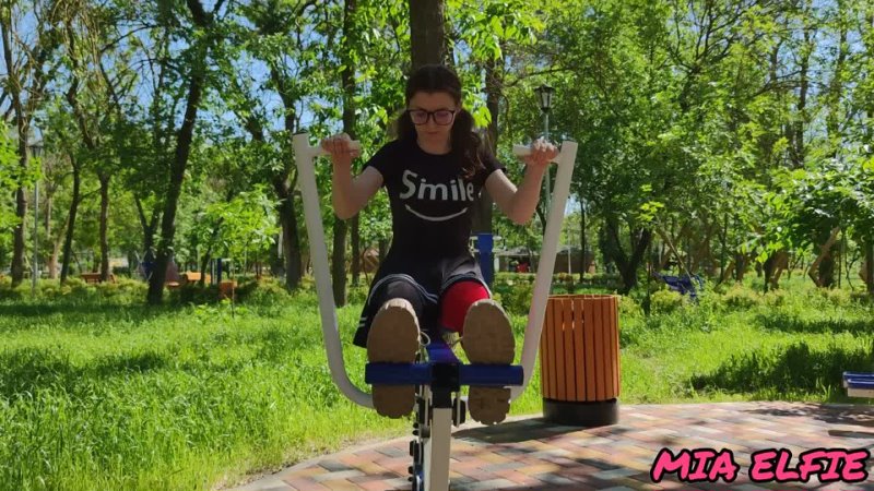 cute schoolgirl in glasses and stockings skips class while walking in central