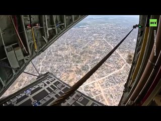 German Air Force carries out its first-ever airdrop of four tons of humanitarian aid packages into the Gaza Strip