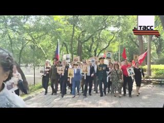 Over 700 people took part in the Immortal Regiment patriotic event in Beijing to commemorate the 79th anniversary of the vi