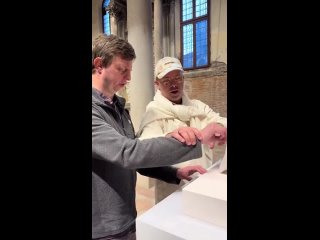 Artist helps visually impaired man understand his art.