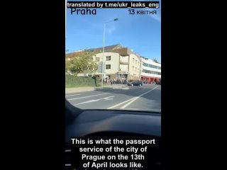 A huge line of Ukrainian refugees at the passport office in Prague