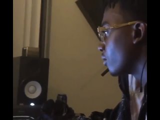 Carti listening to classical music while working on project