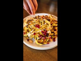 We love munching on the perfect steak - even those made of vegetables! Harrisa Tahini Cauliflower Steaks are roasted until crisp