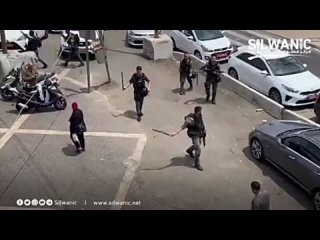 Friendly Israeli police giving two lost men directions