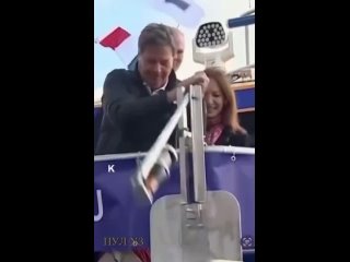 This is how Germany is at war with Russia.  Deputy Prime Minister Habaek and a bottle of champagne during the launch of the ship