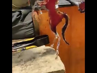 A Murano glass master making the Ferrari horse