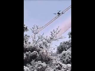 Drones de-icing power lines
