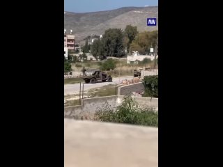 Armed settlers accompanied by the IDF storming Duma, east of Nablus city