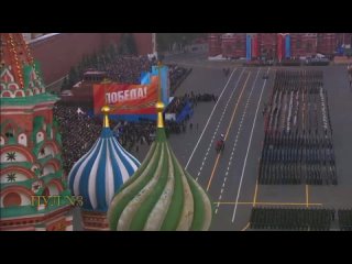 It's snowing in Moscow.  Through the Blizzard: For the first time in history, the Victory Parade takes place under the snow
