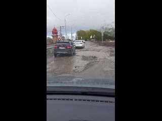 Состояние дорожного полотна на ж-д переезде в Аракчино. (видео)