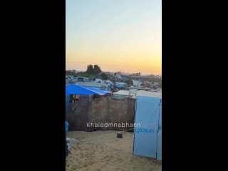 An Israeli warplane bombs the camps of displaced Palestinians in Rafah, southern Gaza