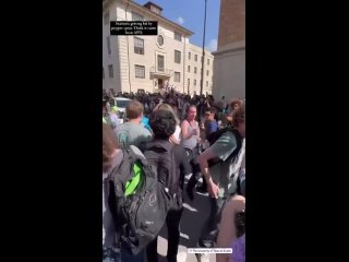 Despite pepper spray and arrests by Texas police, protesters at UT Austin march to retake the south lawn they were forced from