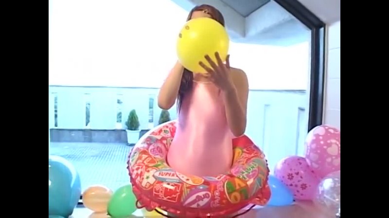 Japanese-girl-inflates-her-pink-swimsuit-twice-includes-balloon-stuffing redband