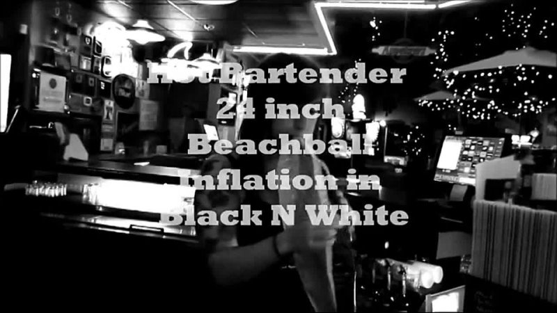 Hot Bartender blowing up 24 inch beachball in Black and