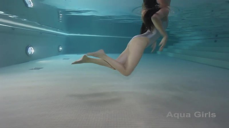underwater model with silver swimsuit in the