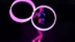 Girl Performs with LED Hula Hoops