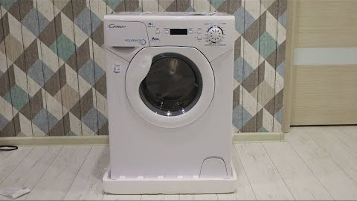 Candy Aquamatic 2D1140 07 - компактная стиральная машина под раковину