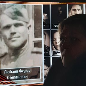 Фотография "Около фото деда в галерее славы  в главном храме Вооружённых сил"