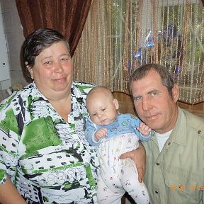Фотография "с женой и внуком"
