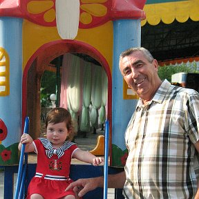 Фотография "я с  внучкой г Т Курган июль 2012"
