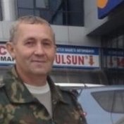 Александр Голик