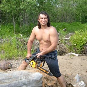 Фотография "Лето 2007 год  на речке пилим дрова "