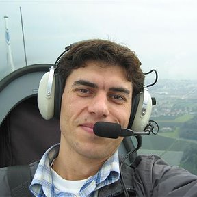 Фотография "Это Я!!!Осень 2005 года.Лечу на маленьком самолёте, за спиной у меня Боденское озеро!Очень люблю летать!!!"