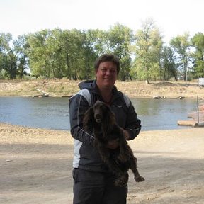 Фотография "Ахтуба , октябрь 2007 г. , на руках моя любимая собака по кличке Тагора"