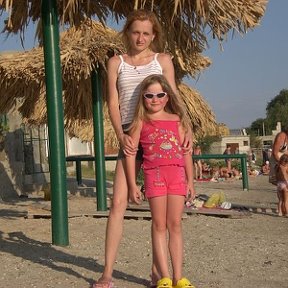 Фотография "июль 2007 года с дочкой на море"