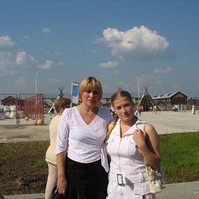 Фотография "я с дочерью на празднике "день села-2007г.""