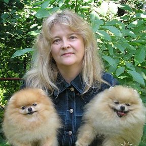 Фотография "Я со своими собачками - порода -померанский шпиц. 2006 год"