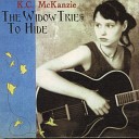 K C McKanzie - The Widow Tries to Hide