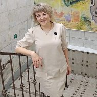 Елена Комоликова