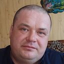 Олег Конов
