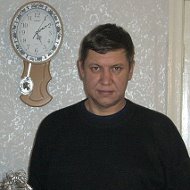 Александр Олейников