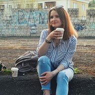 Оля Романенко